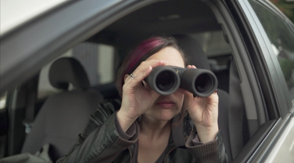 Women looking through binoculars